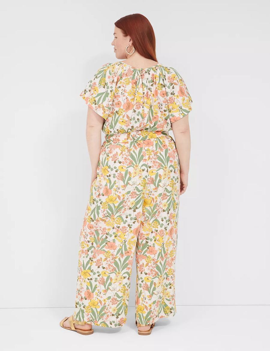 Lane Bryant Flutter-Sleeve Smocked-Neck Wide Leg Jumpsuit Dames Geel Gekleurd | SBU2593EQ